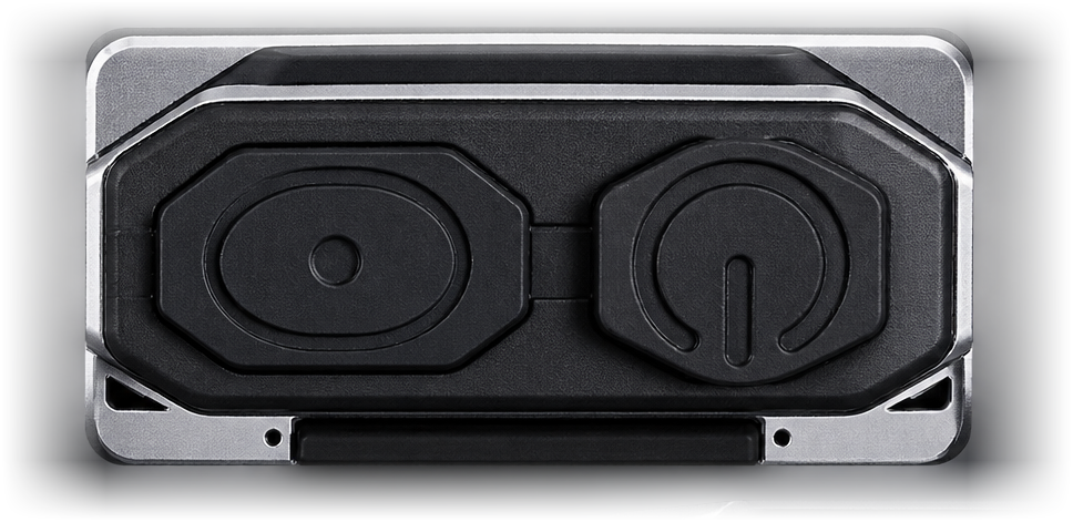 The two independent switches on the back of the RavenTorch, with the belt clip below